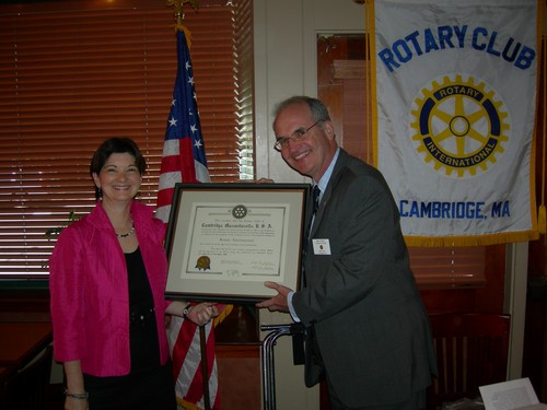 The Rotary Charter is passed from President For Life Denise Jillson to our new leader, President Marc O'Brien.